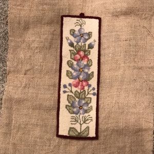Vintage floral needlepoint wall hanging. Flora’s Cheticamp, Nova Scotia